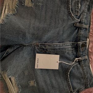 Stylish Blue Jeans by [Brand]